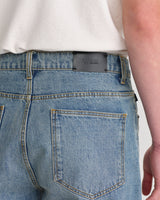 Russell - Jean droit en denim selvedge délavé bleu